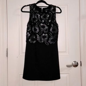 Black with leather flower lace cutouts.